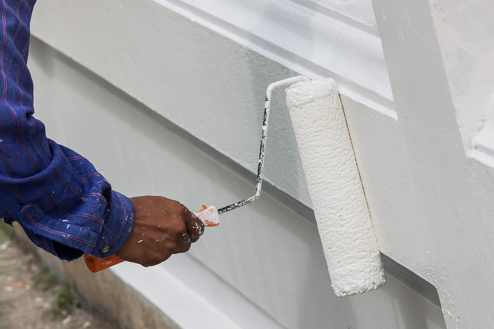 Florida home exterior with freshly painted stucco walls